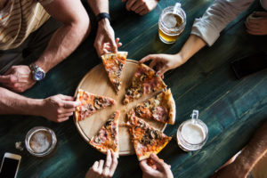 People eating pizza